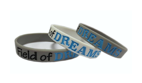 3 field of dreams wristbands stacked on top of eachother
