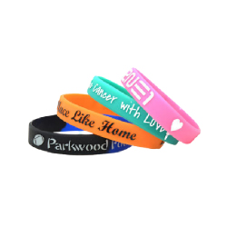 four wristbands with different logos zoomed out